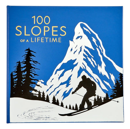 100 Slopes of A Lifetime" by Graphic Image features a skier silhouette amid snowy mountains and pines in blue and white—a gorgeous tribute to must-see ski destinations for your ultimate bucket list.