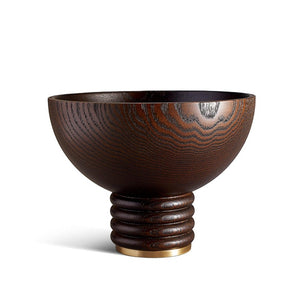 The Alhambra Bowl Collection by L'Objet features a dark Smoked Ash Bowl with a textured grain, rounded body, ribbed circular base, and metallic accent—an elegant decorative piece inspired by Alhambra Gardens.