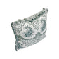 The Alhambra Pillow by Hive Custom Pillows features a green and white floral design with tasseled edges, blending luxury and style to elevate any space.
