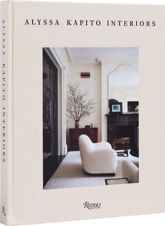 Cover of the "Rizzoli: Alyssa Kapito Interiors" book by Rizzoli featuring a stylish interior design with contemporary touches and a focus on a plush, textured armchair.