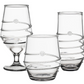 The Amalia Clear Acrylic Drinkware Collection by Juliska includes three textured pieces: a stemmed goblet and two stemless tumblers with straight bases.