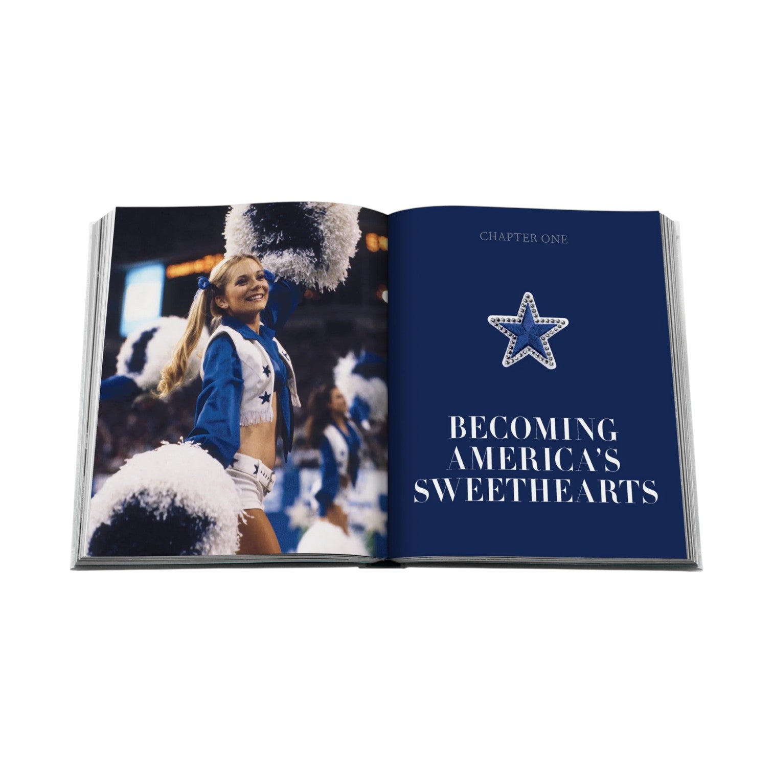 An open book from Assouline's *America's Sweethearts- Dallas Cowboys Cheerleaders* shows a cheerleader on the left and "Chapter One: Becoming America's Sweethearts" with a star on the right, reflecting their cultural impact.
