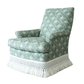 Hickory Chair Virginia Skirted Swivel Chair featuring green upholstery with a white floral pattern, a straight back, cushioned seat, elegant mahogany front posts, and a decorative white fringe skirt along the bottom edge.