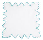The Haute Home Sultan Coaster Set features white square handkerchief coasters with blue scalloped edges—an elegant touch for home décor or your next gathering.