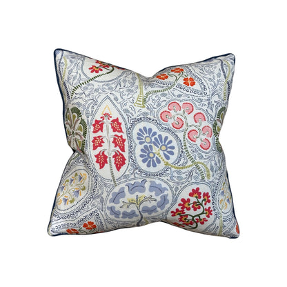 The Arboretum Pillow by Hive Custom Pillows is a square, handmade 100% down-filled pillow with a white background and vibrant floral and leaf patterns in red, blue, green, and pink for luxurious comfort.