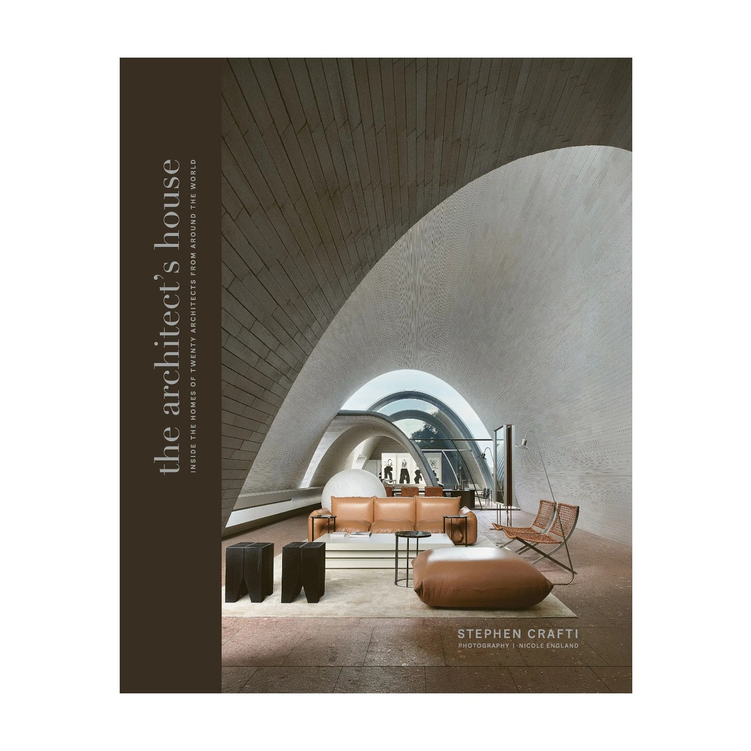 The cover of Architect's House by Chronicle Books shows a modern interior with curved concrete ceilings, large windows, and minimalist furniture—ideal for those looking for contemporary house design ideas.