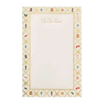 A Rifle Paper Co. Holiday Argyle Notepad with an argyle border featuring holiday icons like candy canes, bells, and gingerbread men, with the text “’Tis The Season” at the top.