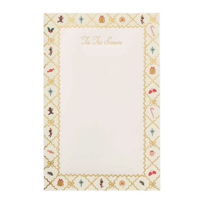 A Rifle Paper Co. Holiday Argyle Notepad with an argyle border featuring holiday icons like candy canes, bells, and gingerbread men, with the text “’Tis The Season” at the top.