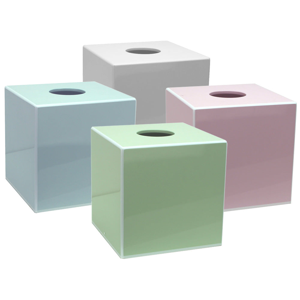 The Addison Ross Lacquer Tissue Box Collection features four square covers in pastel blue, green, pink, and white with a high-gloss finish, circular openings, and removable magnetic bases for easy refills.