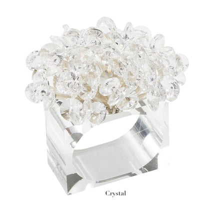 The Aster Napkin Ring by Kim Seybert features a clear rectangular beaded design with faceted glass beads on top and "Crystal" labeled below—an elegant accent for your table décor.