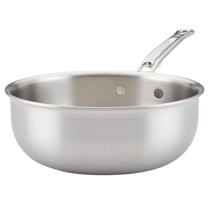 The Hestan Thomas Keller Commercial Clad Stainless Steel Saucier, 2qt, features a rounded base and ergonomic handle, displayed against a plain white background.