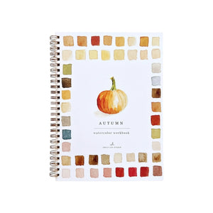 The Emily Lex Studio Watercolor Workbook is a spiral-bound notebook adorned with a watercolor pumpkin and a border of colored squares on the cover, making it an ideal choice for your next painting or art project.