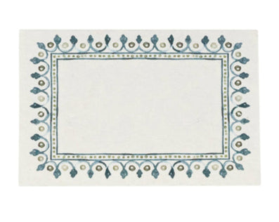The Juliska Villa Seville Chambray Place Cards feature a decorative blue and green border inspired by Seville motifs, adding charm and elegance to your table setting.