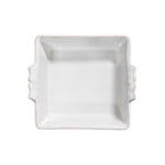 A 9-inch square white ceramic stoneware baking dish from Juliska's elegant Berry & Thread Collection, featuring two small side handles and shown from above against a plain white background.