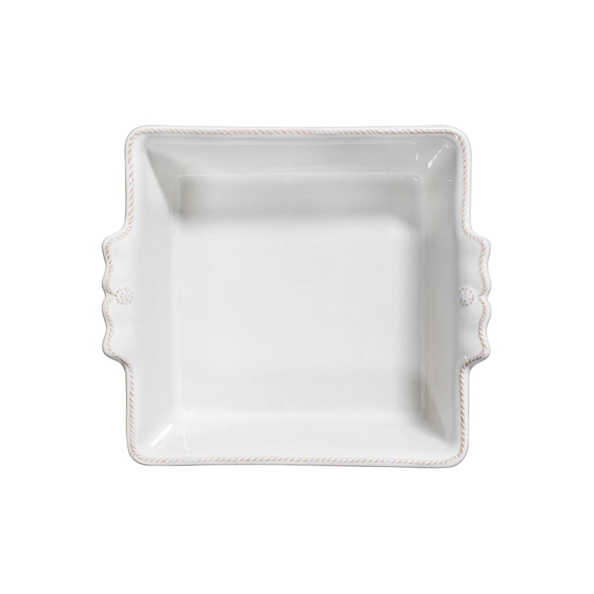 A 9-inch square white ceramic stoneware baking dish from Juliska's elegant Berry & Thread Collection, featuring two small side handles and shown from above against a plain white background.