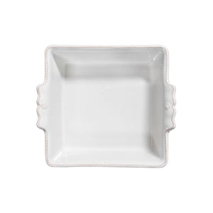 A 9-inch square white ceramic stoneware baking dish from Juliska's elegant Berry & Thread Collection, featuring two small side handles and shown from above against a plain white background.