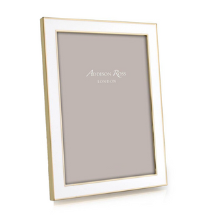 An Addison Ross Gold Trim Enamel Frame from the Gold Trim Enamel Frame Collection stands upright with a blank placeholder inside.