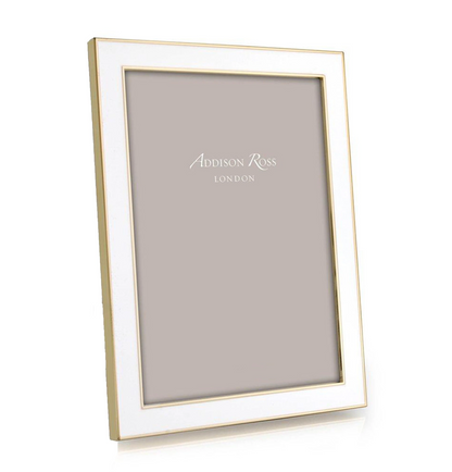 An Addison Ross Gold Trim Enamel Frame from the Gold Trim Enamel Frame Collection stands upright with a blank placeholder inside.