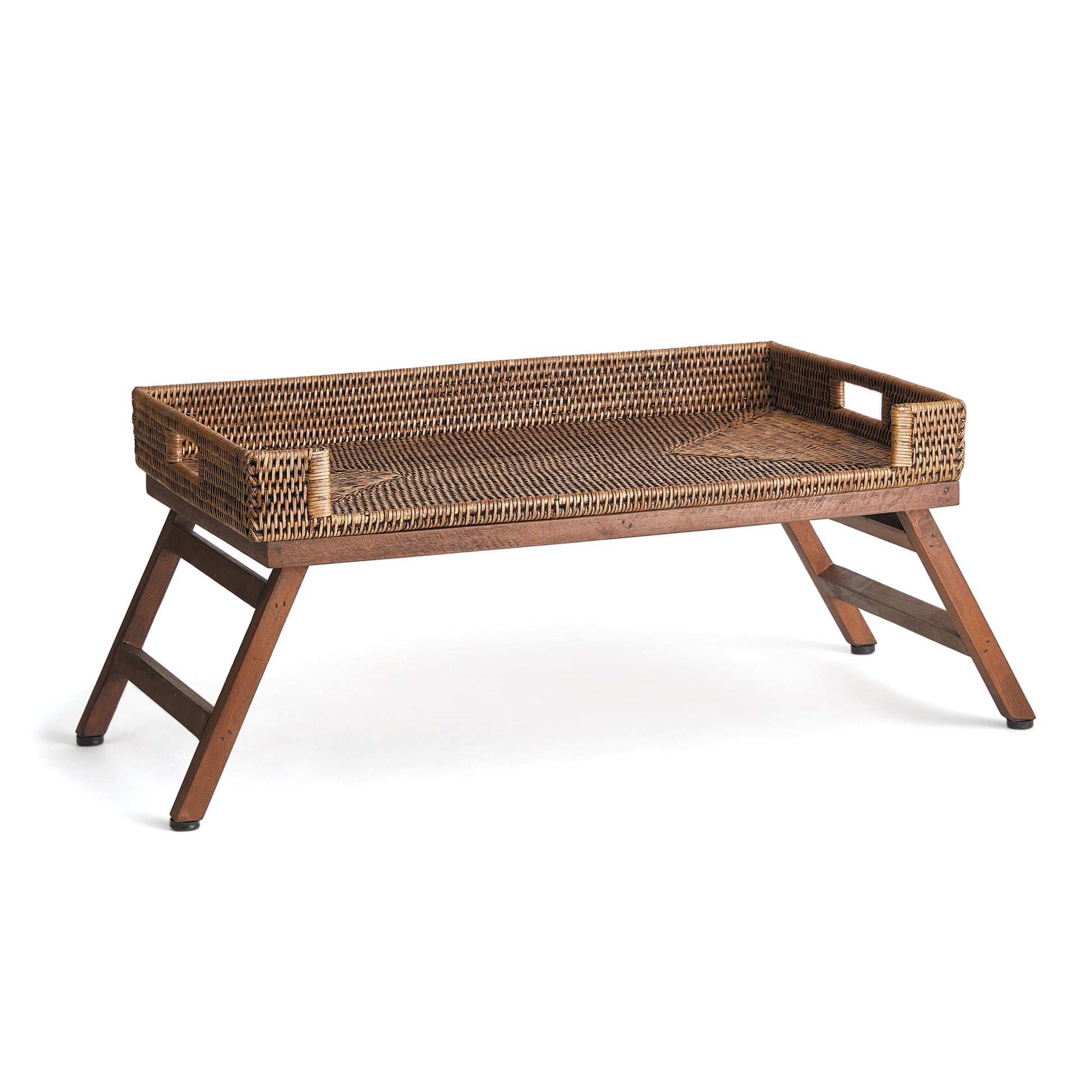 The Burma Rattan Lap Tray Table by Napa Home & Garden features raised sides, cut-out handles, and foldable wooden legs—ideal for breakfast in bed or convenient laptop use.