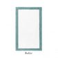 The Graccioza Egoist Border Bath Rug is a rectangular white rug featuring a customizable teal blue border, non-slip silicone coating, and "Baltic" labeled underneath.