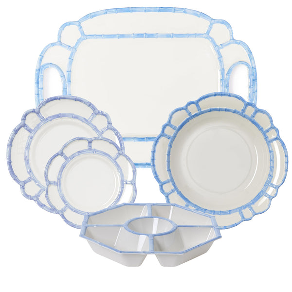 The Two's Company Melamine Bamboo Collection by Two's Company features white plastic plates and bowls with light blue decorative rims, similar in style to French Blue Dinnerware. The set includes a large serving platter and a sectioned dish.