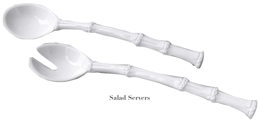 The Beatriz Ball Vida White Bamboo Serveware Collection features two BPA-free white melamine salad servers with bamboo-inspired handles, including a spoon and fork—combining elegance, safety, and versatility for your table.