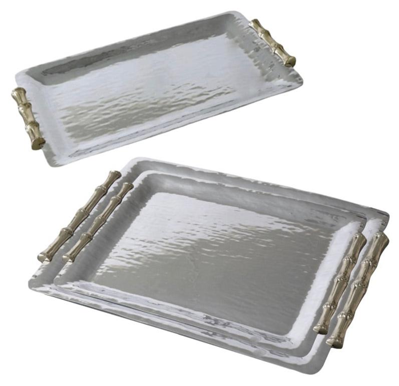 The Beatriz Ball Garden Bamboo Rectangular Tray Collection features three silver aluminum alloy trays with textured surfaces and gold-toned handles, stacked on a white background—ideal for decorative serving.