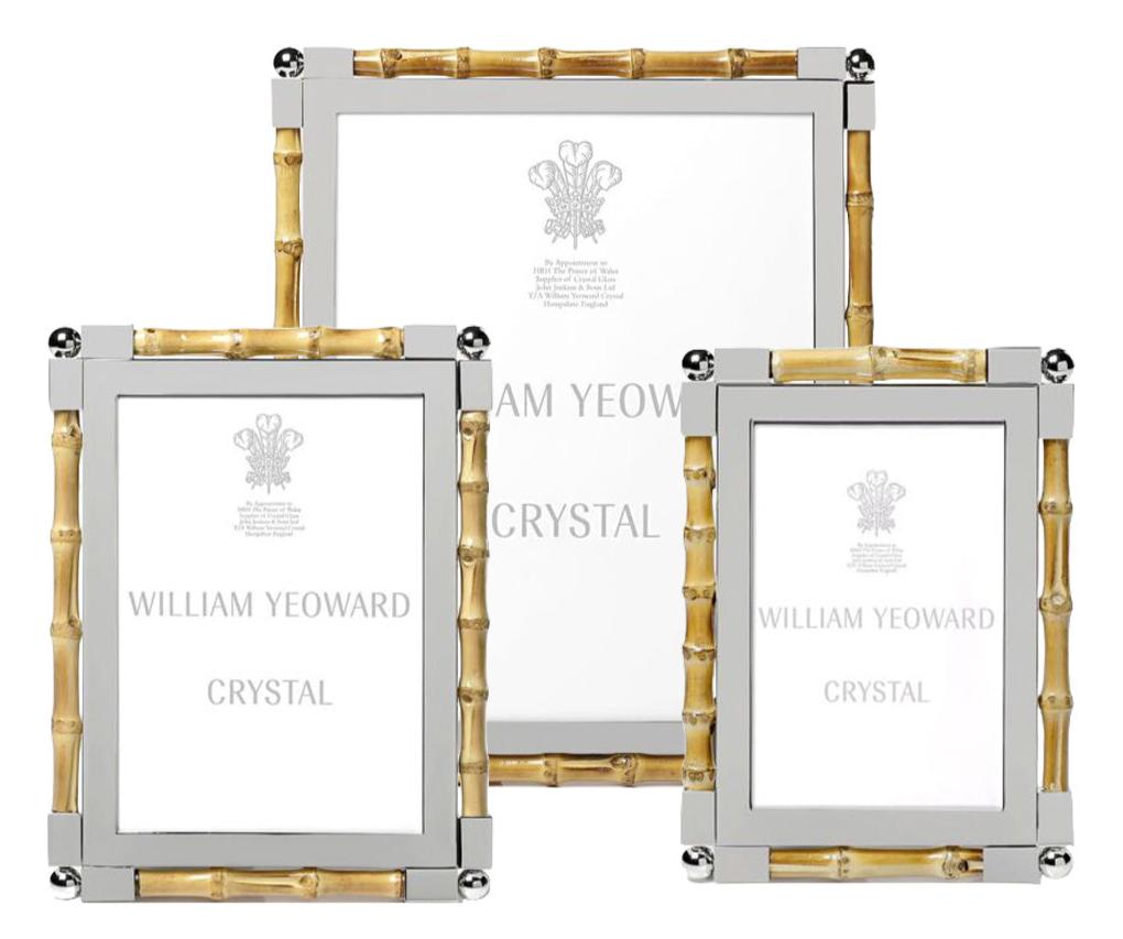 The Bamboo Classic Frame Collection by William Yeoward Crystal features elegant frames with silver, nickel-plated borders and bamboo-style trim—perfect for adding timeless style to your home décor.