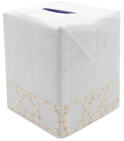 Elevate your home décor with the Haute Home Bamboozle Bath Collection: a square tissue box elegantly covered in white Italian linen and accented by a stitched geometric pattern near the base.