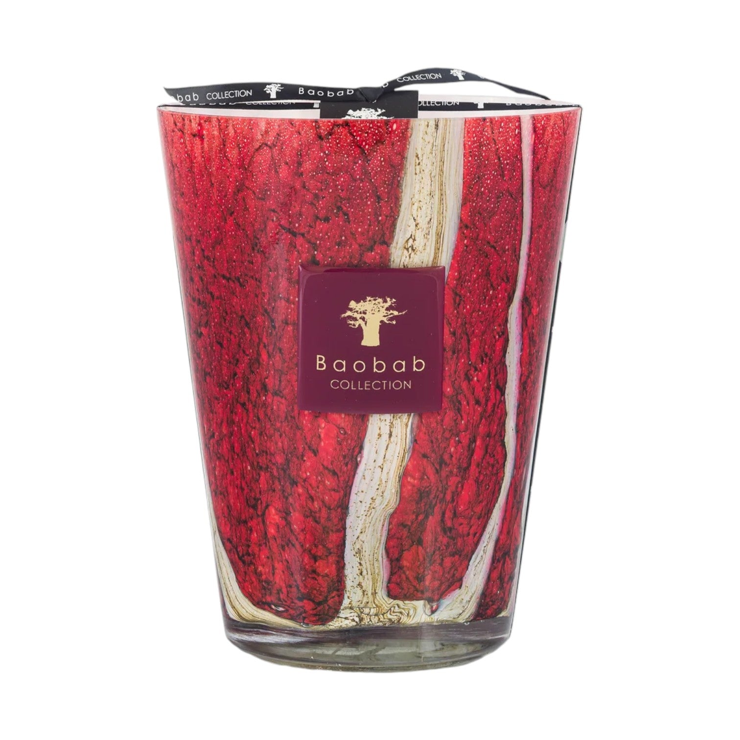The Baobab Collection Woods Risoud Candle is a large red and white artisan glass candle in a holder with a Baobab label and a black ribbon on top.