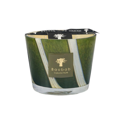 The Baobab Woods Sherwood Candle by Baobab comes in a glass container with a green and white abstract design, a branded front label, and evokes the lush spirit of the English countryside and Sherwood Forest.