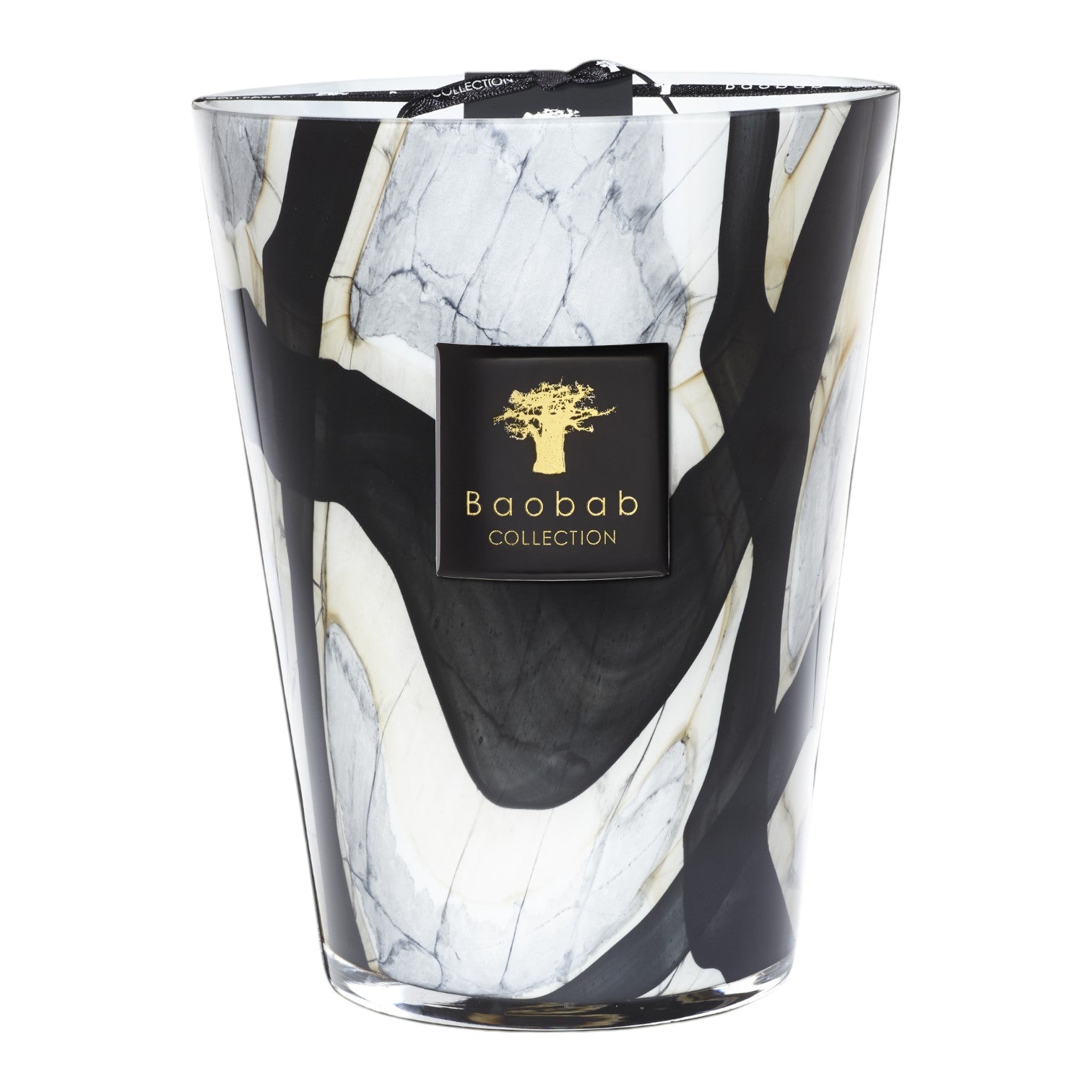 The Baobab Collection Stones Marble Candle by Baobab comes in hand-blown glass with a black, white, and grey marble pattern and a gold-accented label on the front.