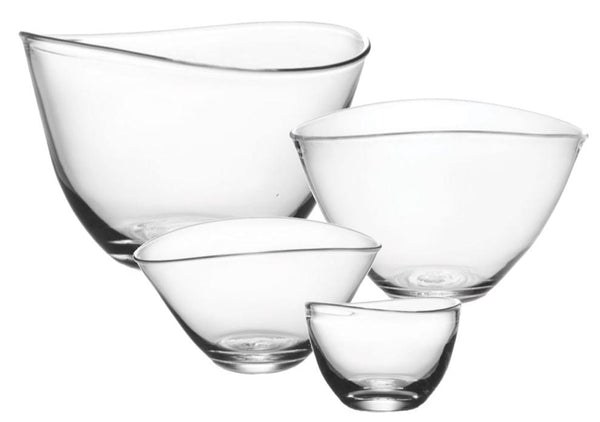 Against a white background, four Simon Pearce Barre bowls from the Simon Pearce Barre Bowl Collection are arranged, showcasing an asymmetrical wave design that adds a touch of modern elegance.