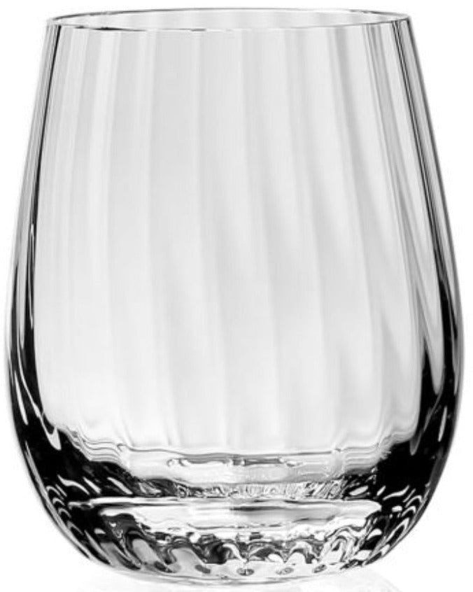 The Corinne Collection tumbler by William Yeoward Crystal is a clear, round glass with a thick base and elegant vertical optic pattern, displayed against a white background.
