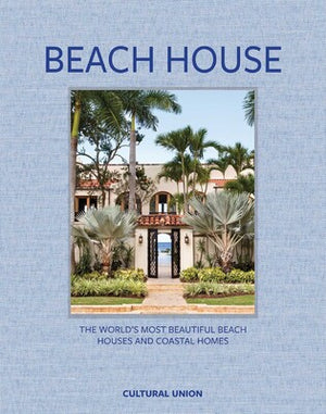 Cover of Beach House, showing a Mediterranean-style home with palm trees and an arched entryway overlooking the ocean.