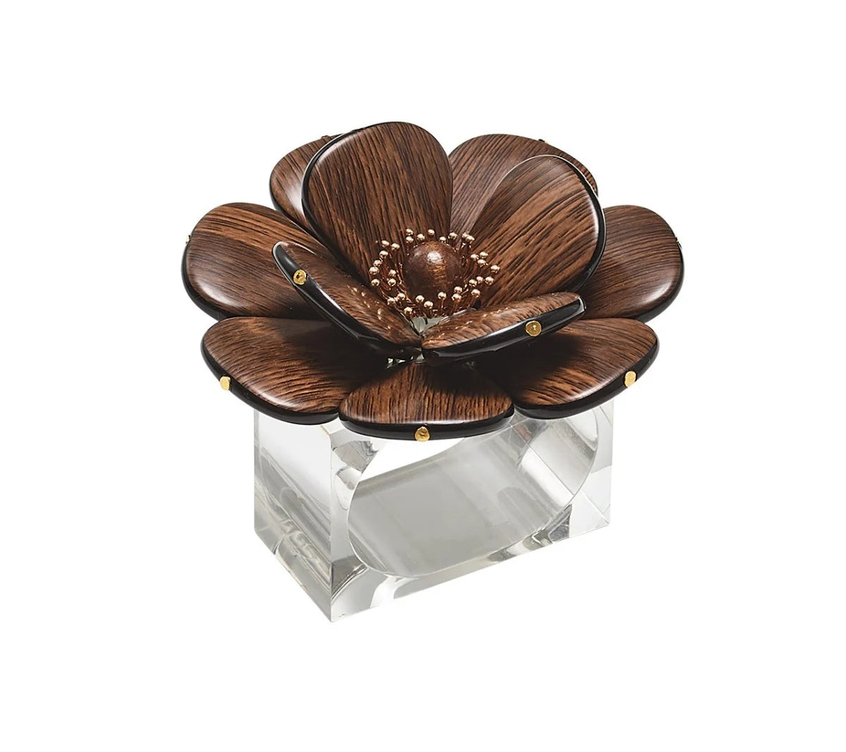 The Begonia Napkin Ring by Kim Seybert features a clear rectangular design adorned with a decorative brown flower on top, complete with wooden petals and delicate gold accents.