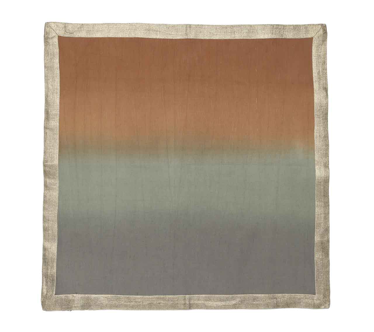 The Kim Seybert Dip Dye Napkin Set features square gradient fabric in autumn hues with brown, gray, and teal transitioning vertically and a textured light brown edge, creating the perfect seasonal effect.