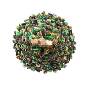 The Kim Seybert Christmas Tree Napkin Ring Set features a round design with clustered green, yellow, and red stones—resembling a jeweled holiday tree—adding festive charm to your table décor.