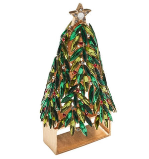 The Kim Seybert Christmas Tree Napkin Ring Set features festive green and gold details, red accents, and a gold star—perfect for adding holiday sparkle to your table setting.