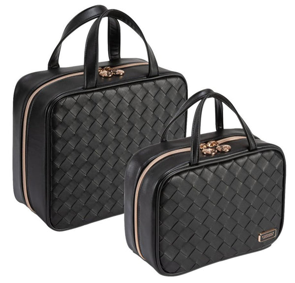 Two sleek black woven leather handbags with handles, gold zippers, and a small front brand plaque resemble the elegant Martha Large Cosmetic Case from the Stephanie Johnson Belize Raven Travel Collection.