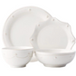 A set of four white ceramic dishes from the Juliska Berry & Thread Classic Whitewash Dinnerware Collection, featuring a dinner plate, scalloped-edge plate, pasta bowl, and small bowl with subtle textured details.