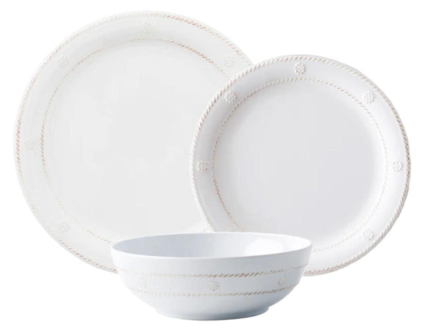 The Juliska Berry & Thread Melamine Whitewash Collection by Juliska is a set of white dinnerware that features the elegant Berry & Thread motif. It includes a large plate, a smaller plate, and a bowl, each adorned with a subtle decorative edge, making it perfect for the adventurous entertainer.