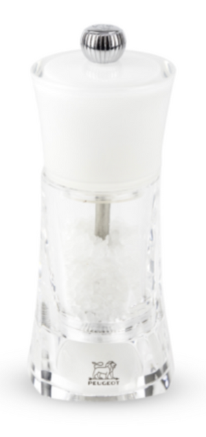 A Peugeot Saveurs Molene Acrylic/White Salt and Pepper Mill with Matte Gold Button Collection with a transparent glass lid.