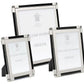 Three upright photo frames from the Black Classic Frame Collection by William Yeoward Crystal, finished in silver and black with a bright shine, each display placeholder paper labeled with the brand name.