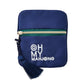 The Oh My Mahjong Coin & Dice Bag is a small navy blue pouch featuring a green-accented zipper, blue tassel, and “OH MY MAHJONG” embroidered in white on the front—ideal for use as a stylish dice bag or accessory pouch.