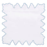 The Sultan Coaster Set by Haute Home features white square linen napkins with irregular, wavy edges trimmed in light blue embroidery—ideal as elegant home décor or sturdy drink coasters. Shown on a white background.