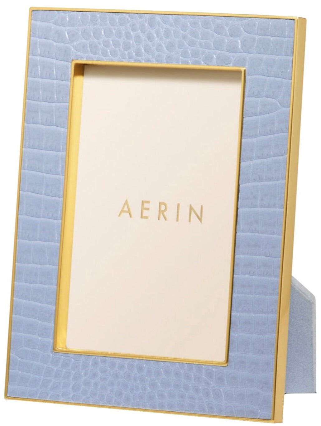 The Classic Croc Leather Frame Collection by Aerin is a rectangular blue photo frame with a gold border, crafted from Italian croc-embossed leather, featuring a placeholder card that says "AERIN.