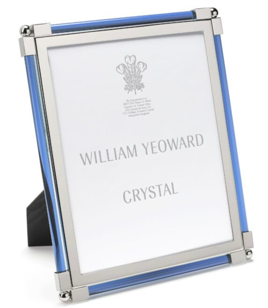The Light Blue Classic Frame Collection by William Yeoward Crystal features a silver and blue nickel-plated photo frame with an upright stand; classic frames like this may include a Proposition 65 warning.