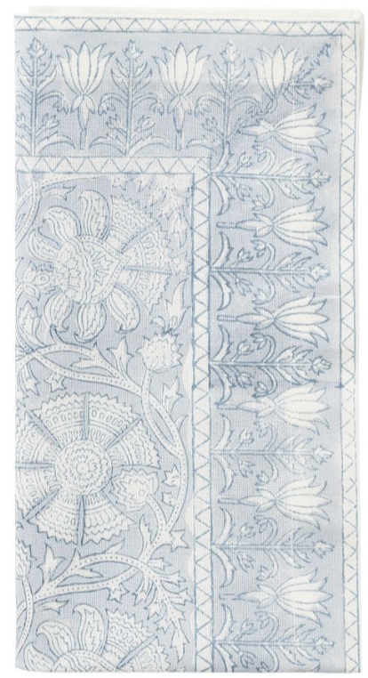The Kim Seybert Provence Napkin Set features light blue and white stylized flowers and leaves, and pairs beautifully with a matching tablecloth.