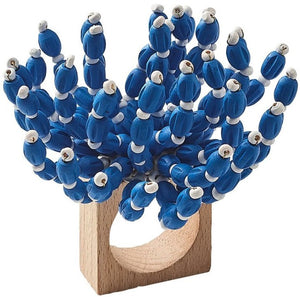 The Kim Seybert Reed Napkin Ring showcases blue and white wooden beads arranged to mimic a coral cluster, making it an ideal accent for coastal-inspired decor.